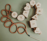Wooden lacing toy with numbers and geometry shapes
